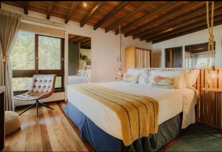 Suíte com design elegante na Villa Gardena