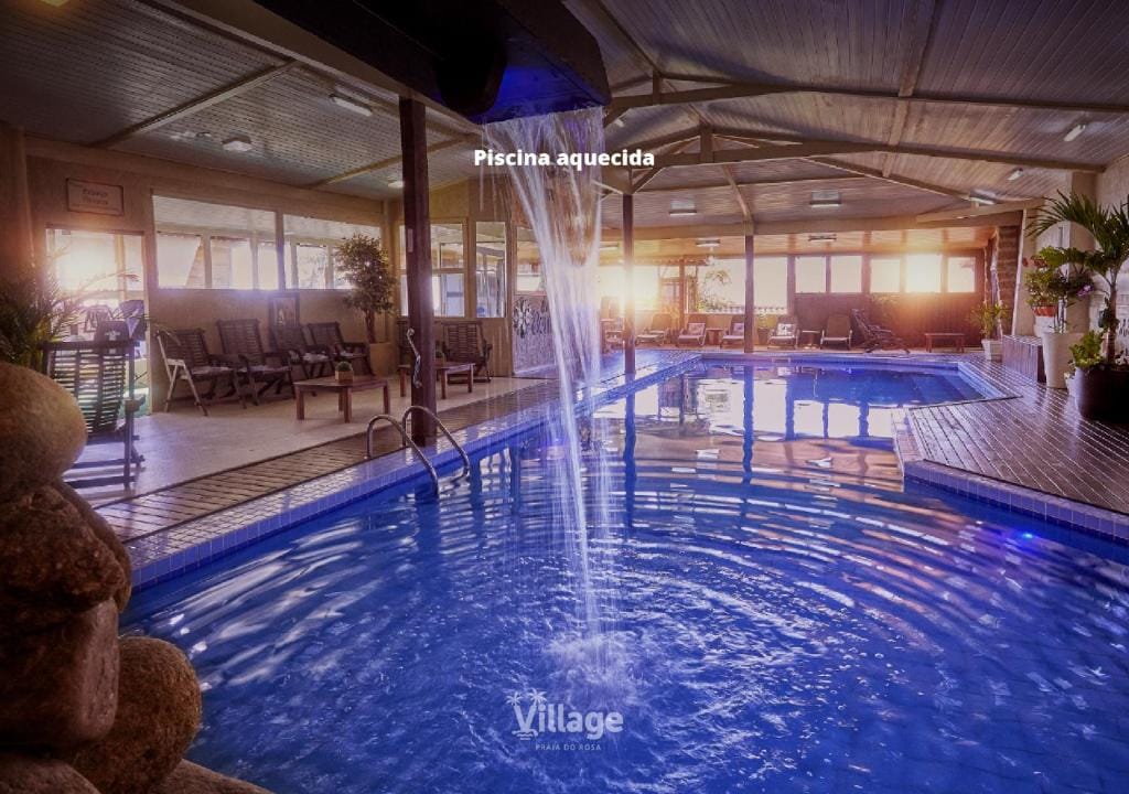 Piscina aquecida no Village Praia do Rosa